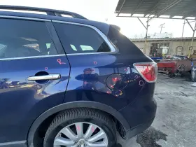 Td1171111f Mazda Used Left Lower Quarter Panel Fits 2010 Cx-9 Wheel Lip Moulding Lef