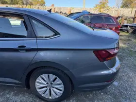 17a809405a Volkswagen 2019-2024 Jetta Left Driver Side Quarter Panel Gray