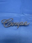 Vintage Coupe 1965-1970 Cadillac Script Emblem Badge De Ville 1483602 Used. Price: $14.99.