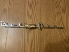 Original 1953-54 Chevrolet Bel Air Script Emblem PT-4151680 & PT-4612776 Broke Used. Price: $22.00.
