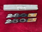 Nos Datsun 280Z Driver's/passenger's Side Lower Fender Emblems Part# 98811-N4200 New. Price: $106.25.