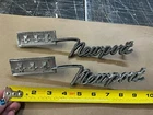 1967 Chrysler Newport 4 Door Quarter Emblems Pair Oem Mopar Used. Price: $74.39.