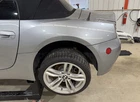 05-08 Bmw Z4 Driver Left Rear Quarter Panel Skin & Light, Silver Gray Met. A08 Used. Price: $350.00.