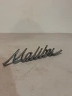 1966-1967 Chevrolet Malibu Quarter Panel Script Emblem Ornament Gm 7660545 Oem Used. Price: $22.50.