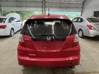 09-14 Honda Fit Sport Rear Trunk Decklid Lift Gate Milano Red R81 Used. Price: $550.00.