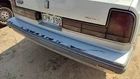 1990-1991 Olds 88 Silver Trim Strip Between Tail Lights And Bumper Oem Panel Used. Price: $270.68.