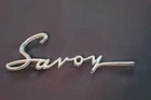 Fender & Quarter Panel Nameplate 1955-56 Plymouth Savoy Used. Price: $75.00.