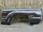 05-15 Toyota Tacoma 6' Long Driver Left Bedside Quarter Panel Black Used. Price: $750.00.
