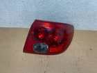 2003-2005 Saturn L200 L300 Sedan Quarter Panel Tail Lights Pair Complte Set Used. Price: $100.00.