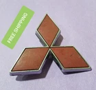 BIN#1 Used 2000 2001 Mitsubishi Eclipse Rear Trunk Decklid Emblem Badge Logo Red. Price: $15.99.