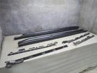 2015-2024 Porsche Macan Left & Right Side Skirt Rocker Panel Molding Bracket Set Used. Price: $496.63.